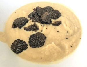 cauliflower soup and shaved black truffle